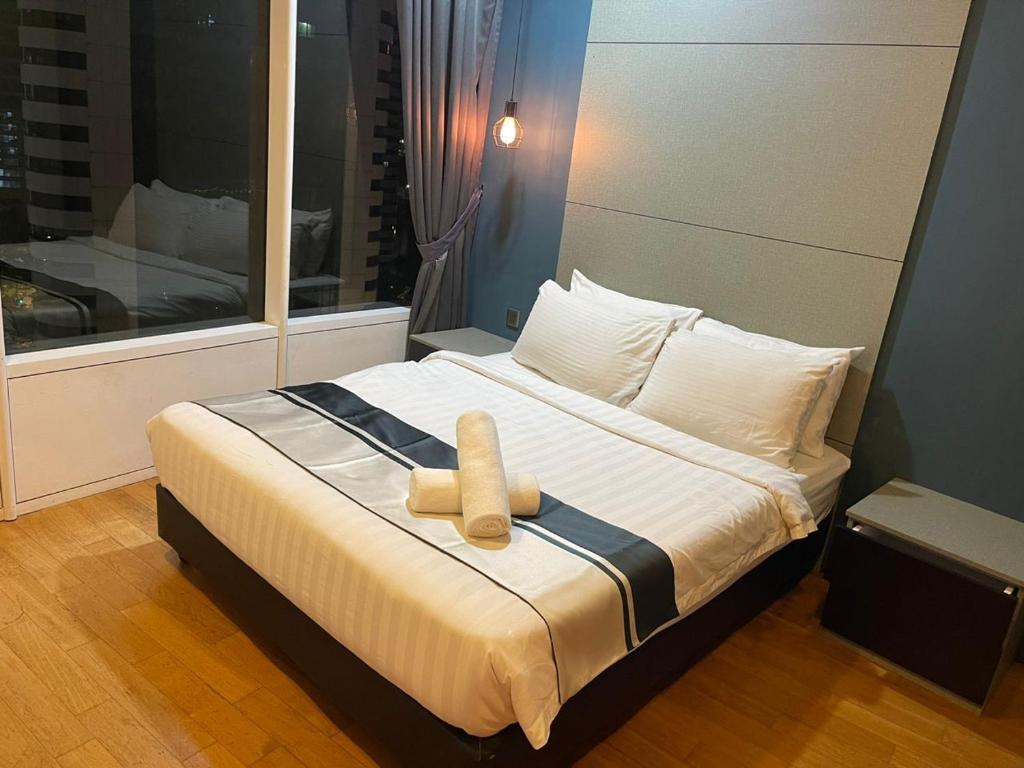 Postel nebo postele na pokoji v ubytování Vortex Family suites Apartment