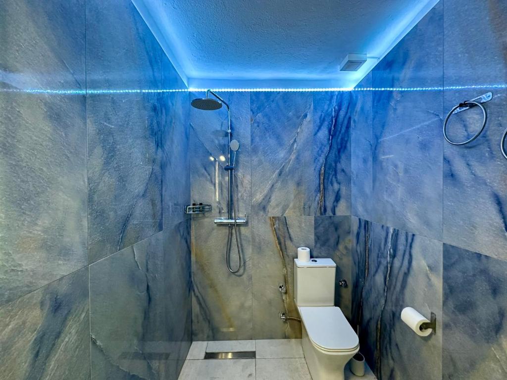Koupelna v ubytování Hotel Argilos