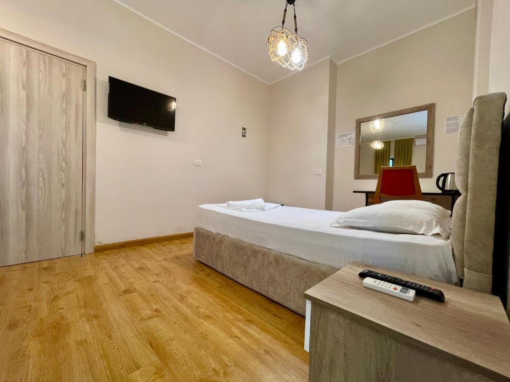 TV a/nebo společenská místnost v ubytování Hotel Globo