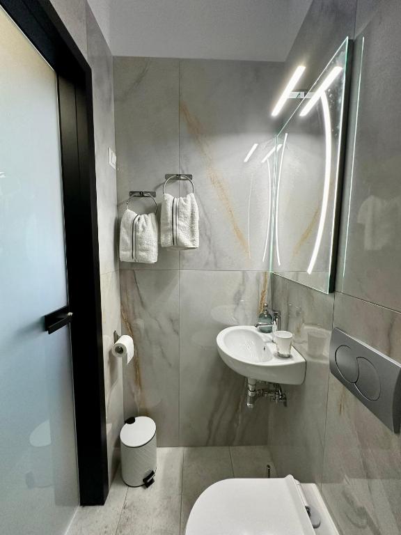 Koupelna v ubytování Hotel Argilos