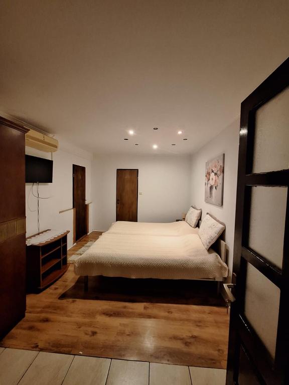Posteľ alebo postele v izbe v ubytovaní AMMA rooms