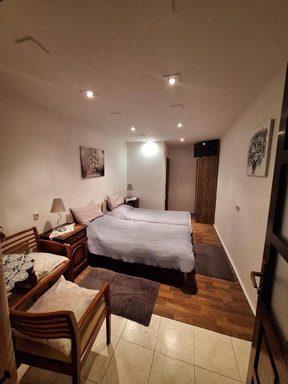 Posteľ alebo postele v izbe v ubytovaní AMMA rooms