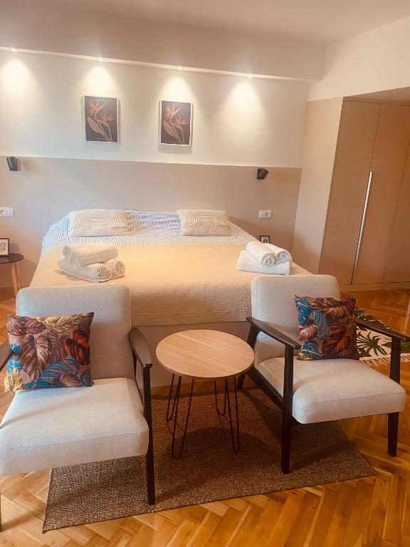 Posteľ alebo postele v izbe v ubytovaní Apartments Nikval