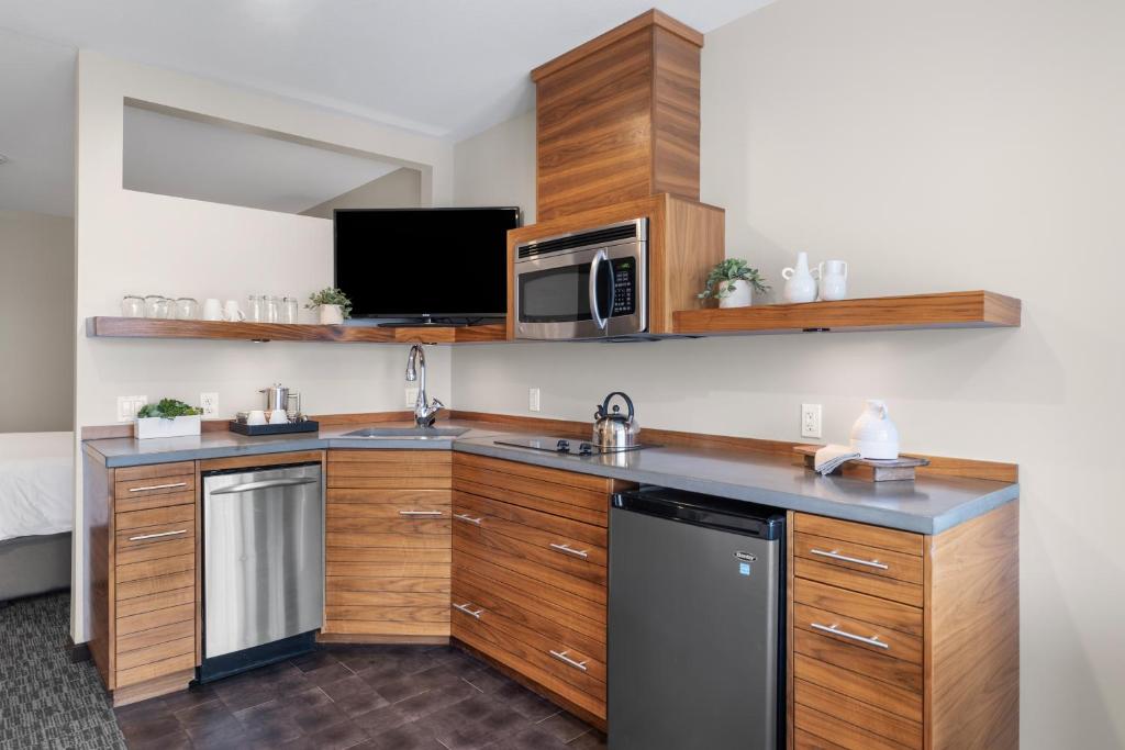 Kuchyň nebo kuchyňský kout v ubytování Oxford Hotel Bend