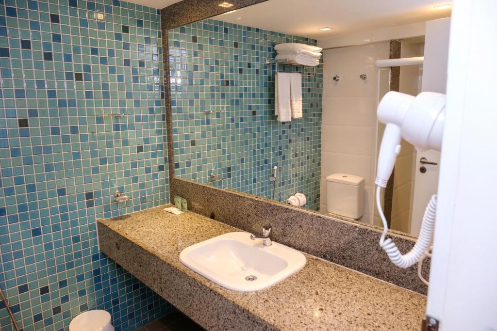 Um banheiro em Marante Plaza Hotel