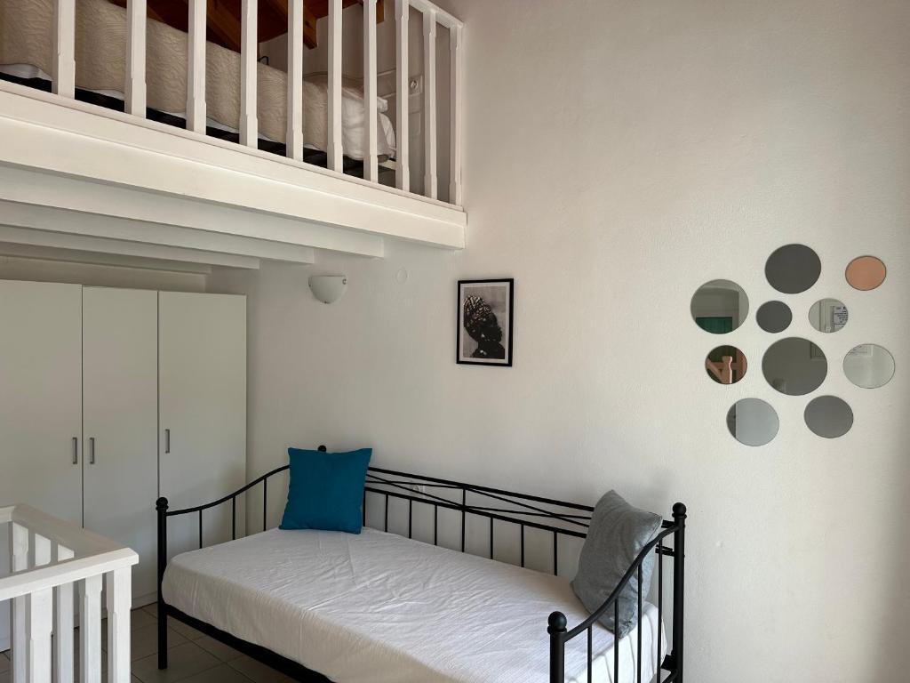 Ένα ή περισσότερα κρεβάτια σε δωμάτιο στο Casa Di Rosse