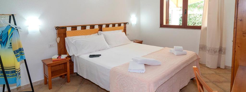 Postel nebo postele na pokoji v ubytování Sa Murta Bianca Guesthouse