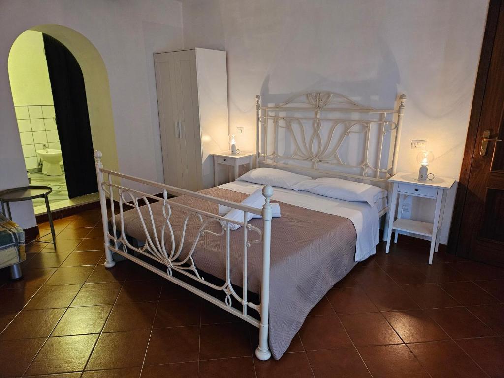 Postel nebo postele na pokoji v ubytování Quattro Olive