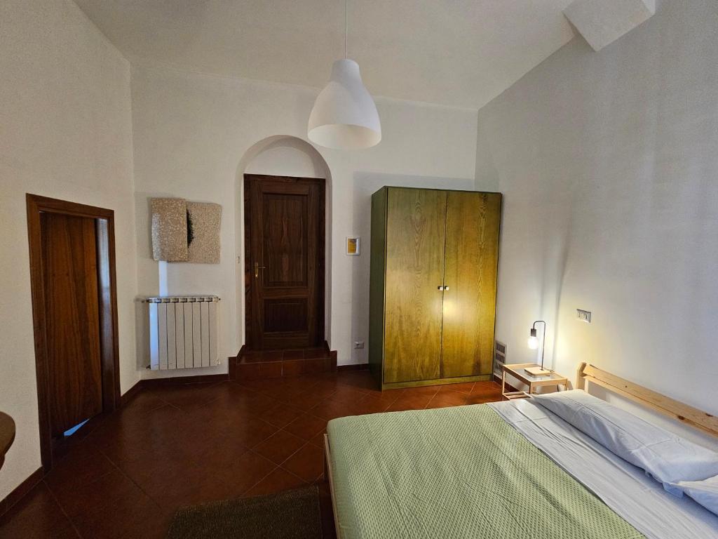 Postel nebo postele na pokoji v ubytování Quattro Olive