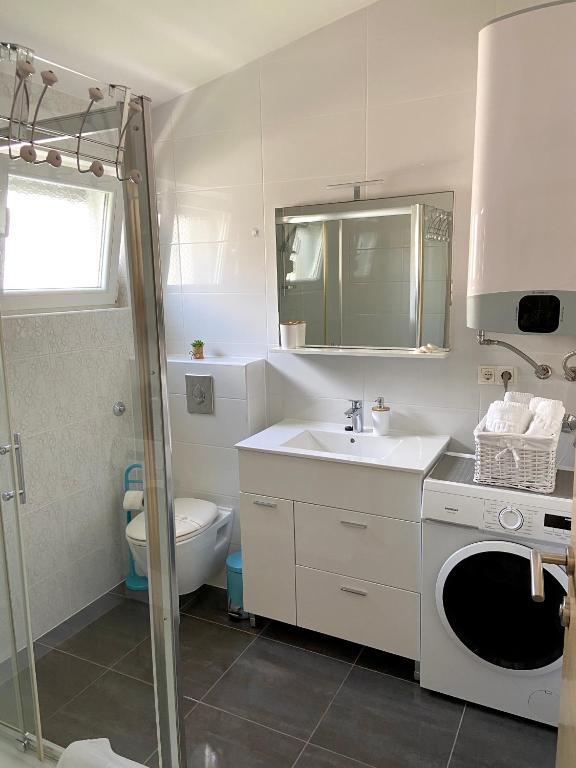 Kúpeľňa v ubytovaní Apartmani Villa Adriatic