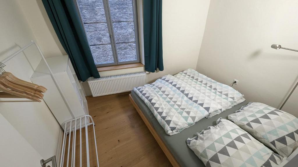 Postel nebo postele na pokoji v ubytování Ferienwohnung Michelskeller