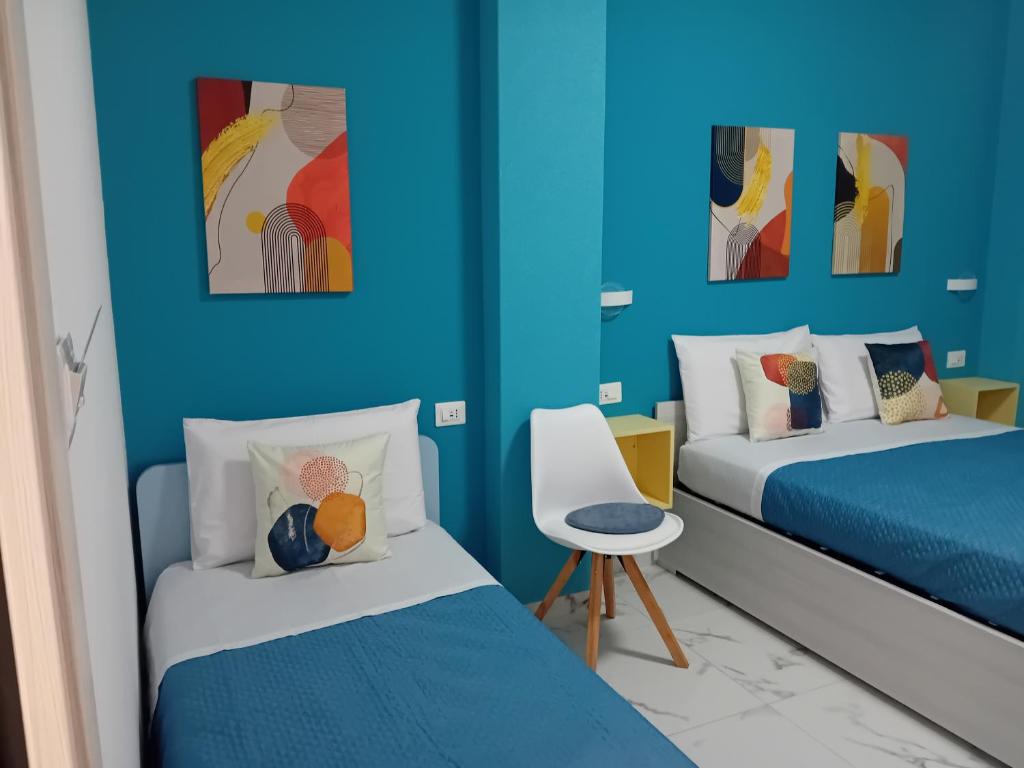 Postel nebo postele na pokoji v ubytování KeyRooms