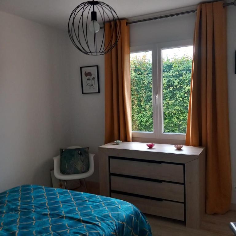 Postel nebo postele na pokoji v ubytování Chambre tout confort