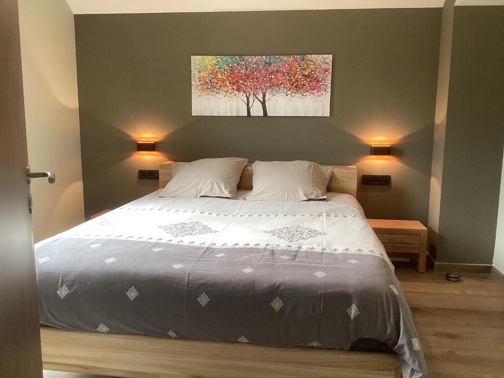 Postel nebo postele na pokoji v ubytování Gîte de la Tour