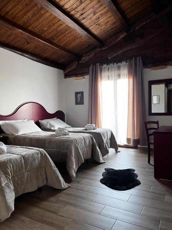 Postel nebo postele na pokoji v ubytování Is Cubas