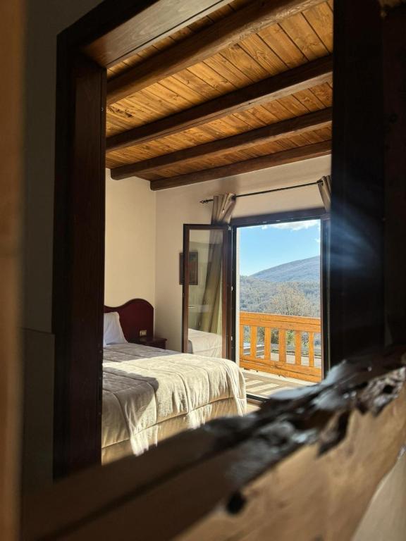 Nespecifikovaný výhled na hory nebo výhled na hory při pohledu z bed and breakfast