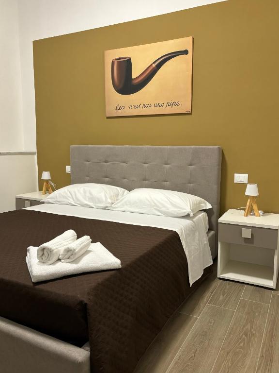 Postel nebo postele na pokoji v ubytování Il dipinto