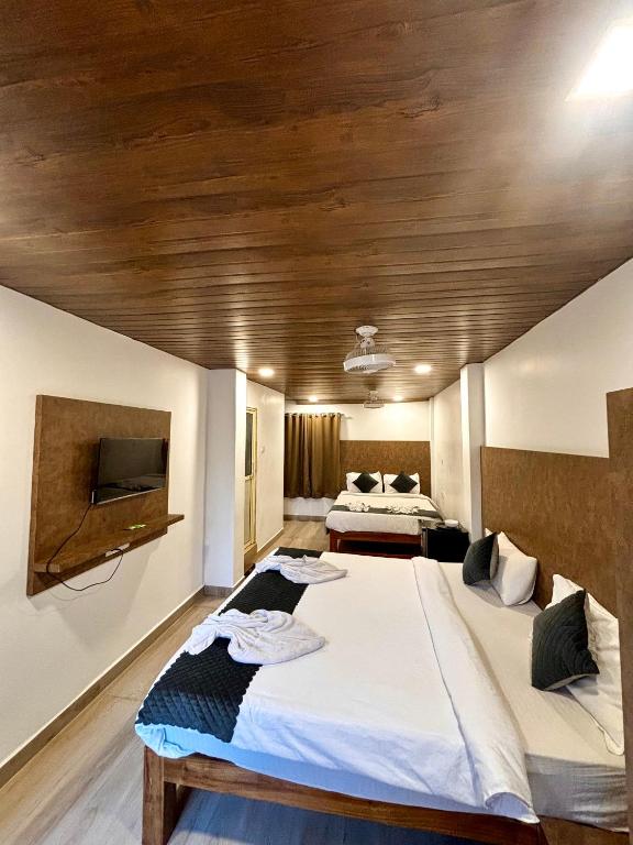 Postel nebo postele na pokoji v ubytování Baga Beach Place