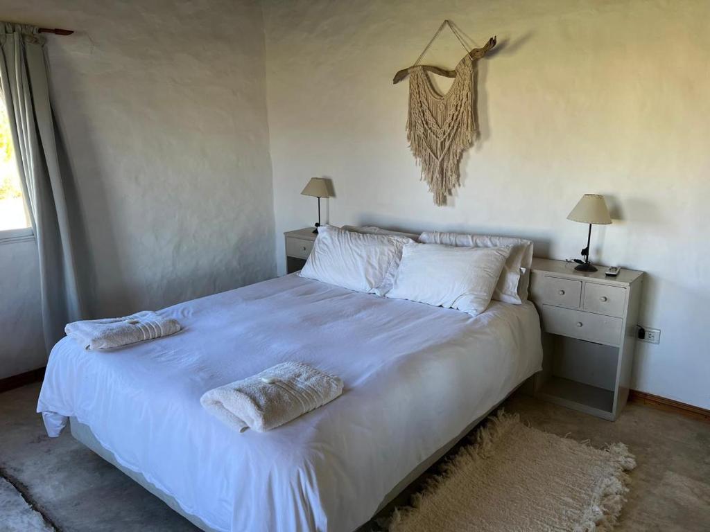 Postel nebo postele na pokoji v ubytování El Campito Cabaña de montaña