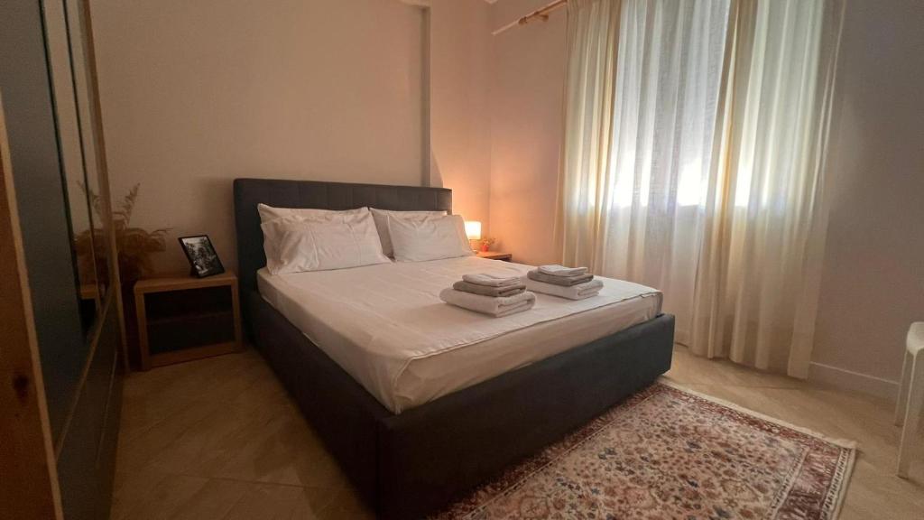 Postel nebo postele na pokoji v ubytování SoFI Condo-Close to Port of Vlore