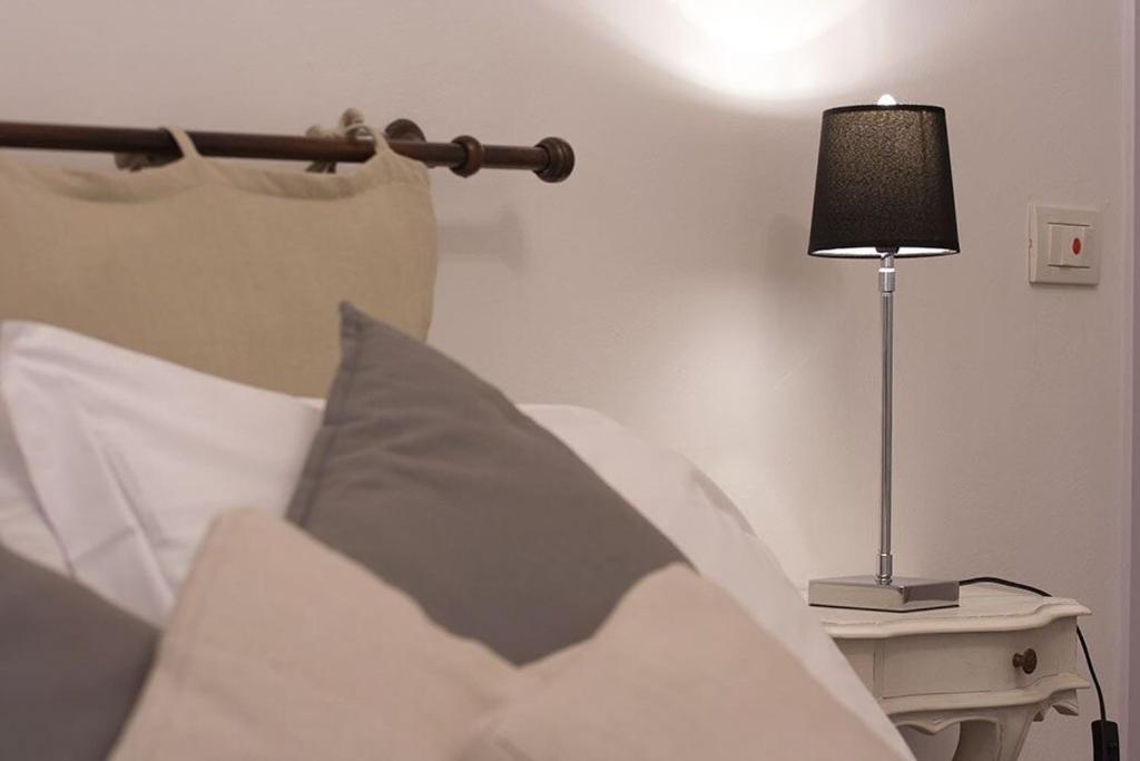 A bed or beds in a room at Cosy House