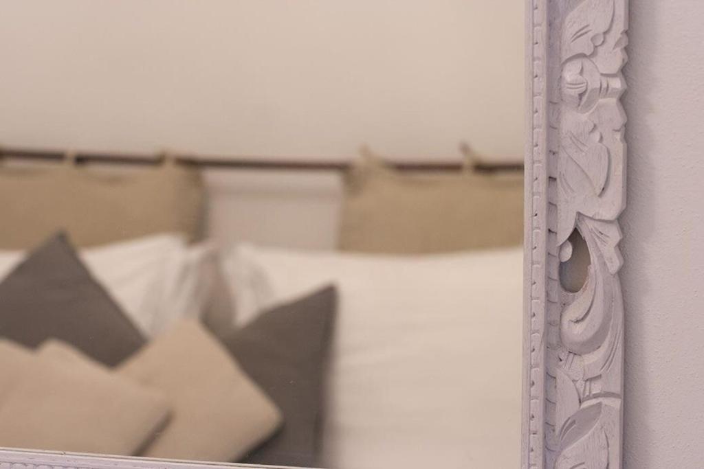 A bed or beds in a room at Cosy House