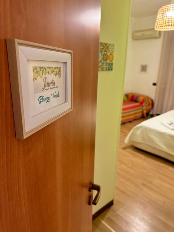 Postel nebo postele na pokoji v ubytování Lumìa Bed and Breakfast