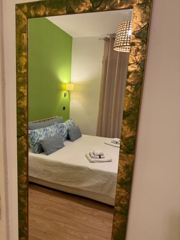 Postel nebo postele na pokoji v ubytování Lumìa Bed and Breakfast