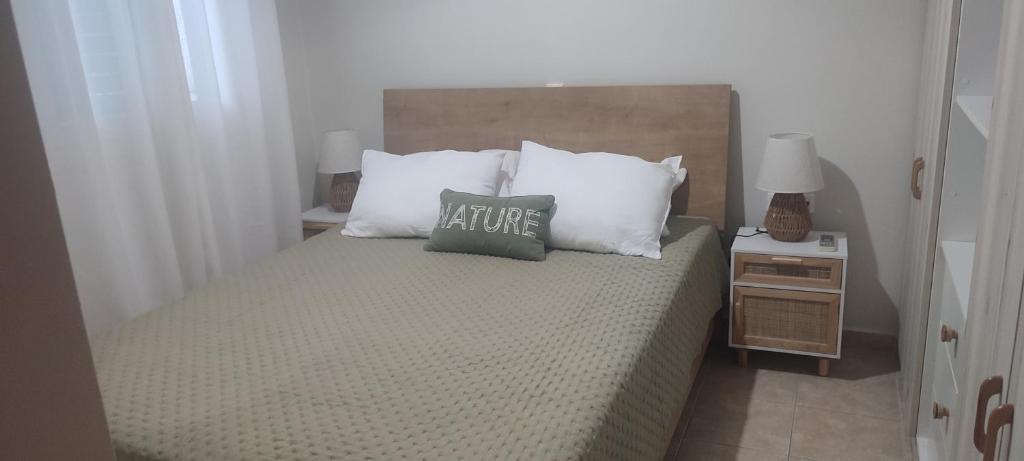 Postel nebo postele na pokoji v ubytování VeVou Apartment