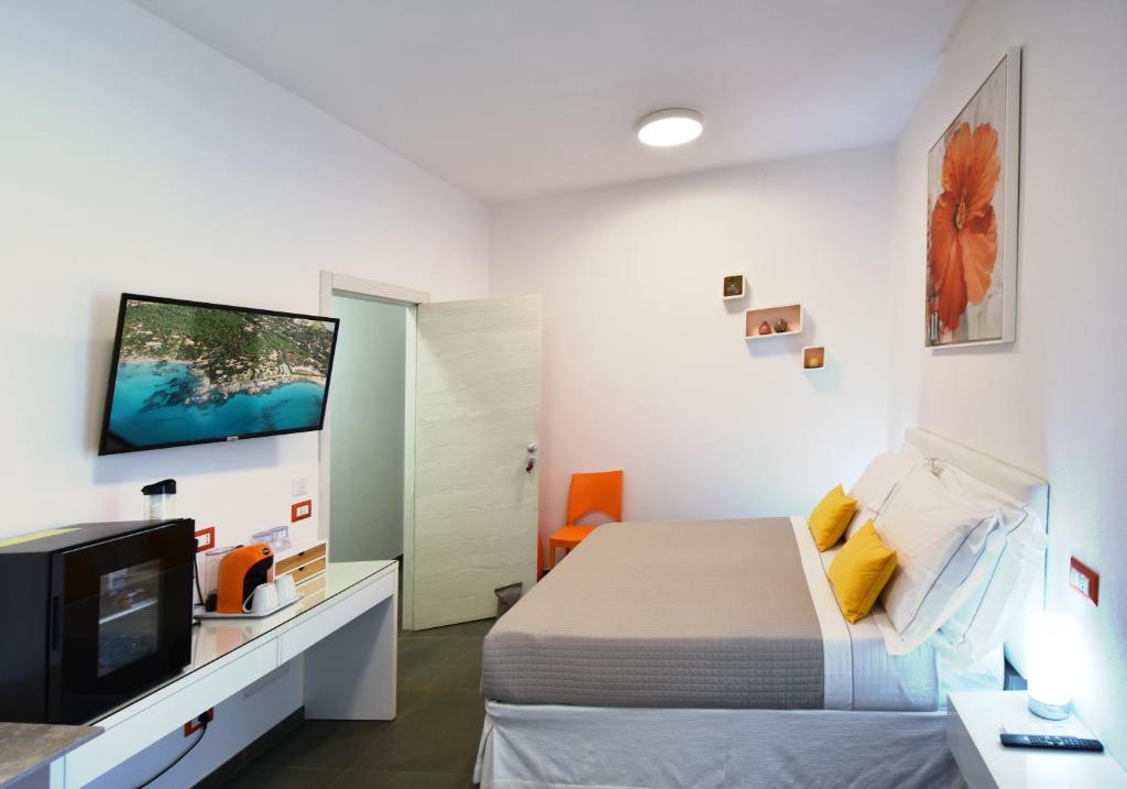 TV a/nebo společenská místnost v ubytování Elis b&b Villasimius