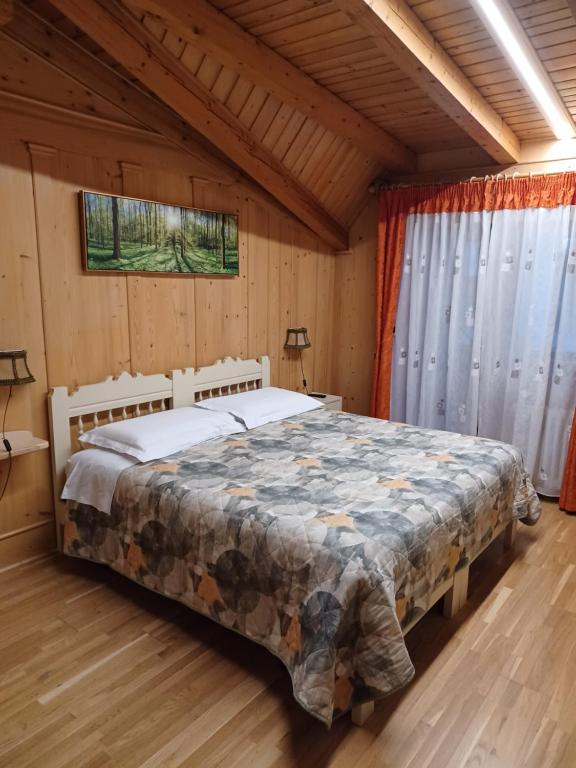 Postel nebo postele na pokoji v ubytování Locanda Da Pierina