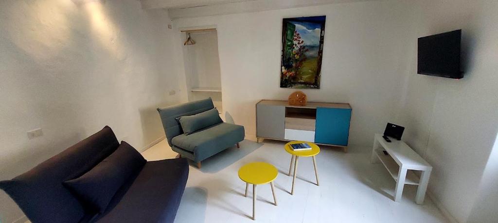TV a/nebo společenská místnost v ubytování Casa Colore