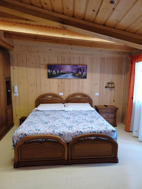 Postel nebo postele na pokoji v ubytování Locanda Da Pierina