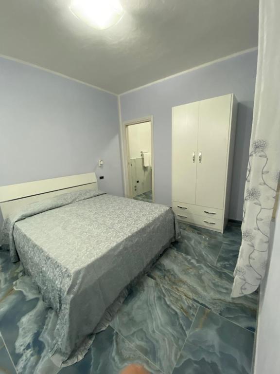 A bed or beds in a room at ''Dimora BellaVista'' - Marina di Camerota