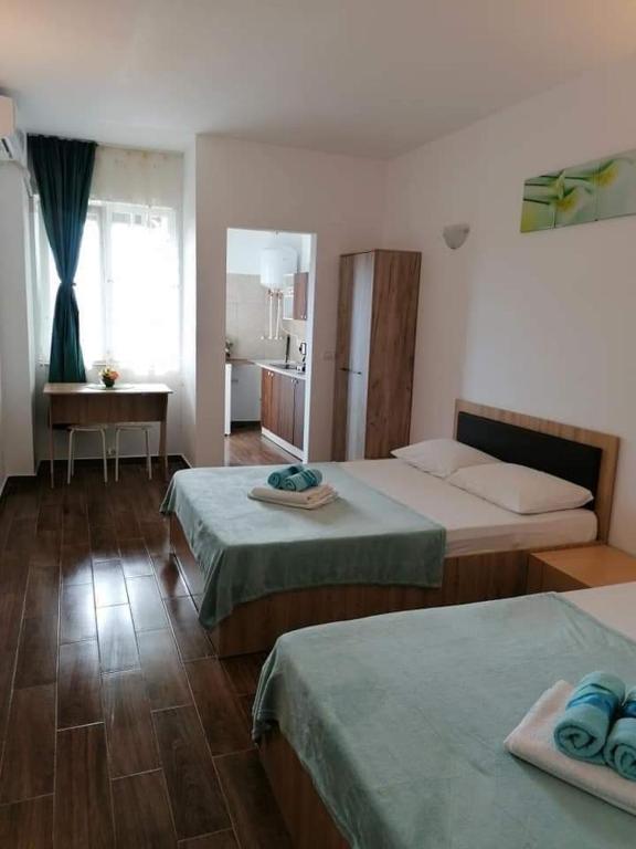 Postel nebo postele na pokoji v ubytování Urban Mood Studio