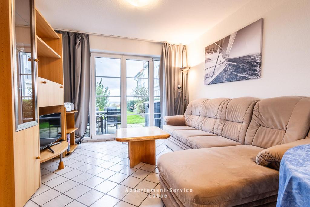 a living room with a couch and a table at Stein W03 in Stein