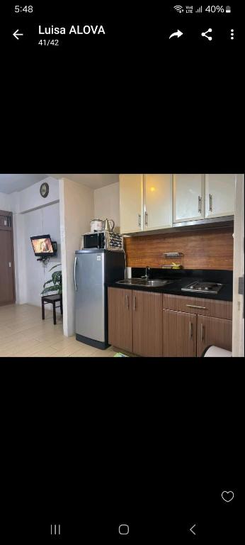 Kuchyň nebo kuchyňský kout v ubytování Henry's Newport Condotel