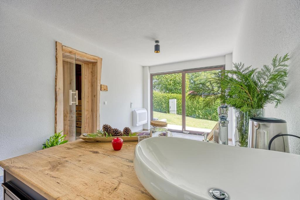 Fotografie z fotogalerie ubytování VILA LISJAK - Apartments v destinaci Podčetrtek