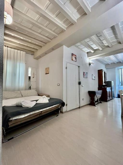 Posteľ alebo postele v izbe v ubytovaní Sweet house near piazza della signoria