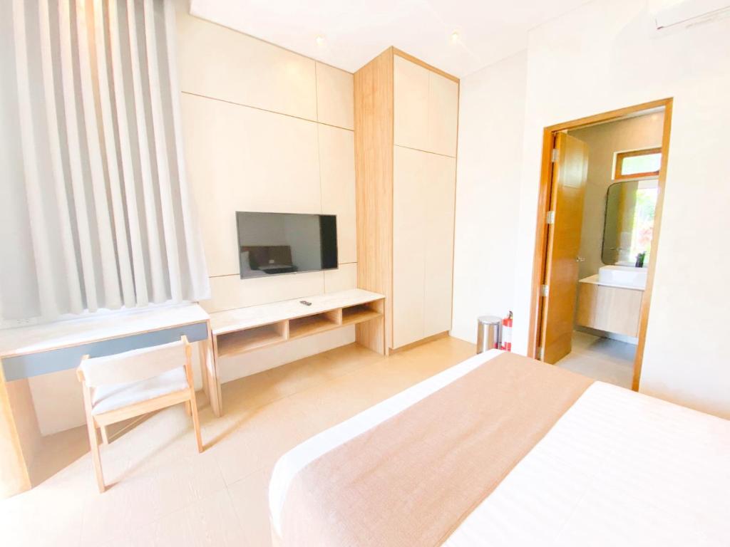 TV a/nebo společenská místnost v ubytování Hortz Hotels And Resorts