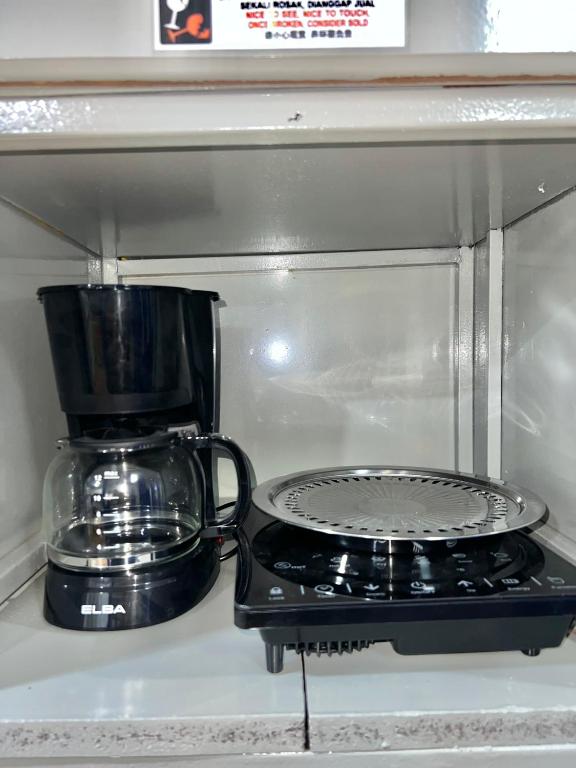 Kuchyň nebo kuchyňský kout v ubytování DP Residence SELAYANG