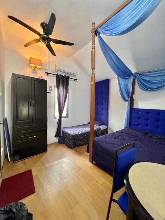 Postel nebo postele na pokoji v ubytování DP Residence SELAYANG