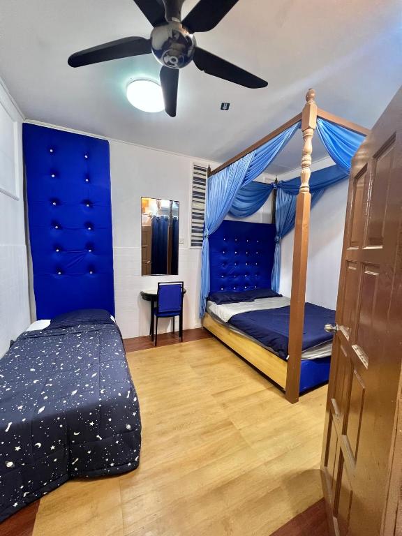 Postel nebo postele na pokoji v ubytování DP Residence SELAYANG