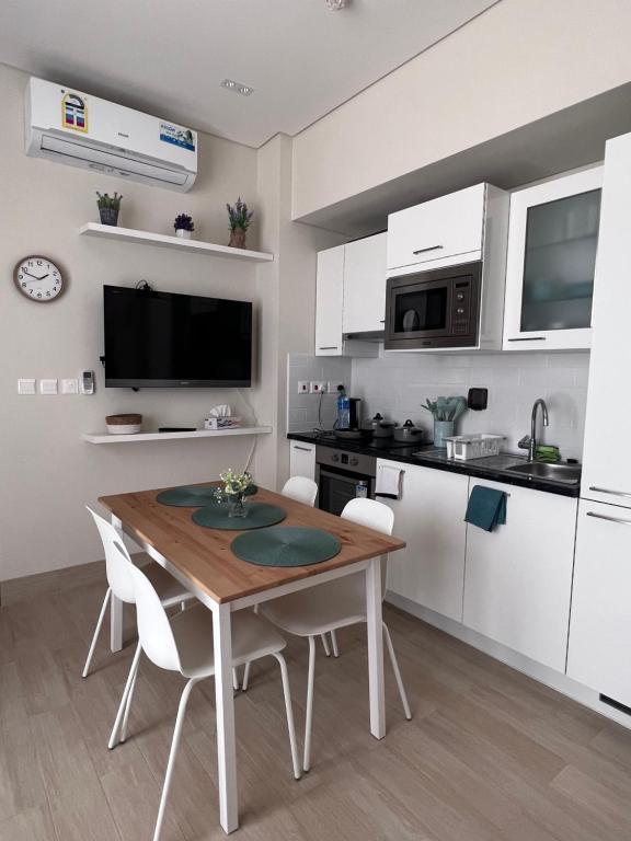 Kuchyň nebo kuchyňský kout v ubytování Lotus Apartment Hawana Salalah