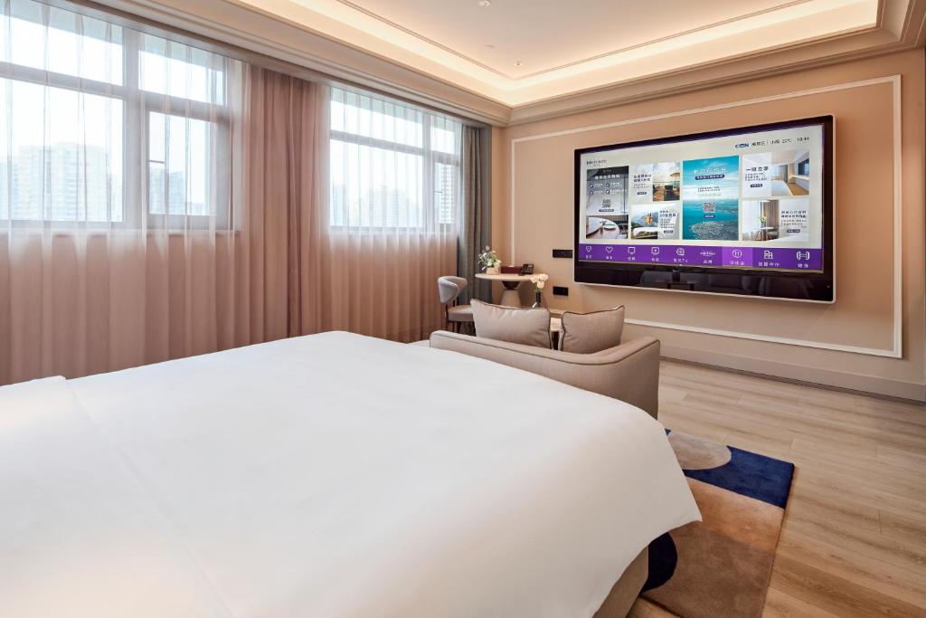 TV a/nebo společenská místnost v ubytování Mercure Xian Dazhai Road