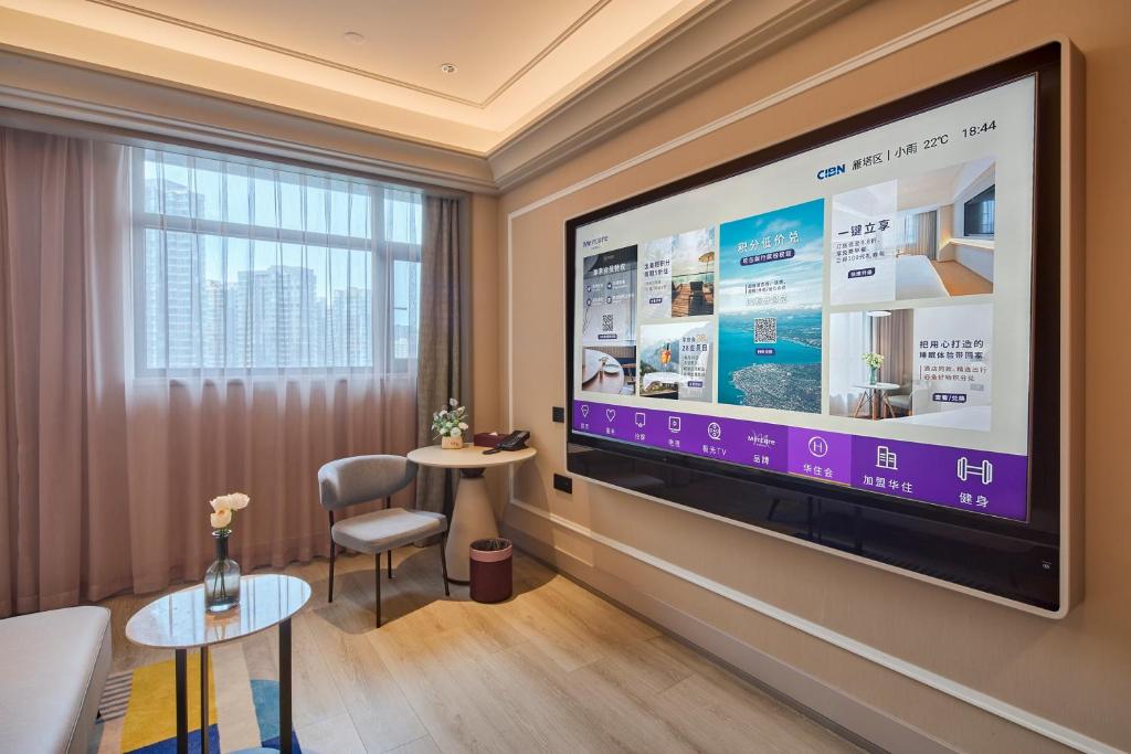 TV a/nebo společenská místnost v ubytování Mercure Xian Dazhai Road
