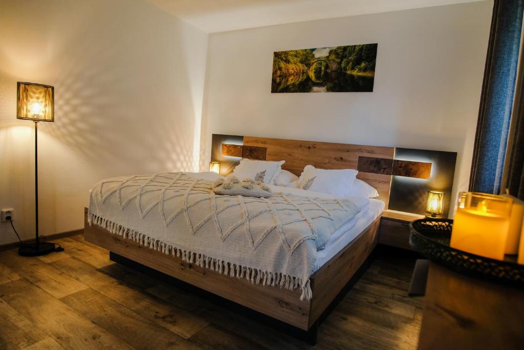 Postel nebo postele na pokoji v ubytování APARTMÁN ZLATÝ DUB
