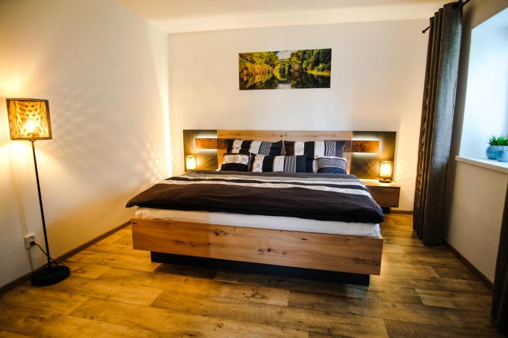 Postel nebo postele na pokoji v ubytování APARTMÁN ZLATÝ DUB