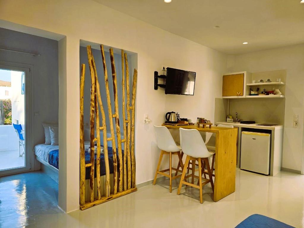 Kuchyň nebo kuchyňský kout v ubytování Coralli Beach Apartments