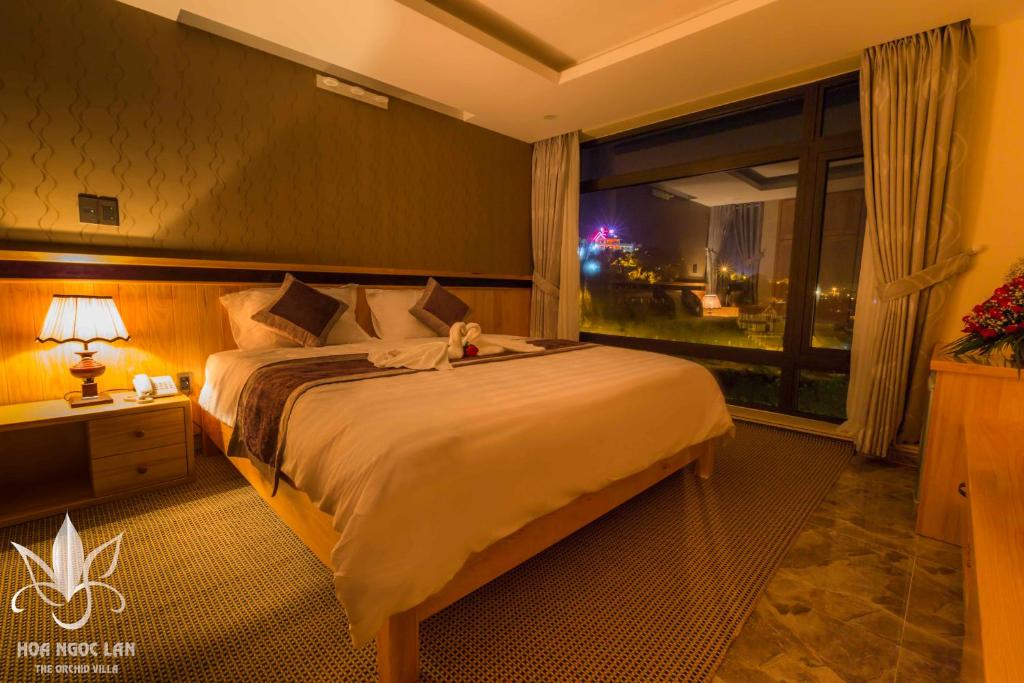 Giường trong phòng chung tại Hoa Ngoc Lan - The Orchid Villa Dalat